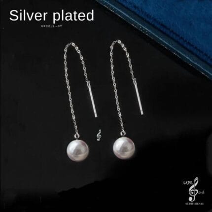 Bellos aretes con perla cultivada